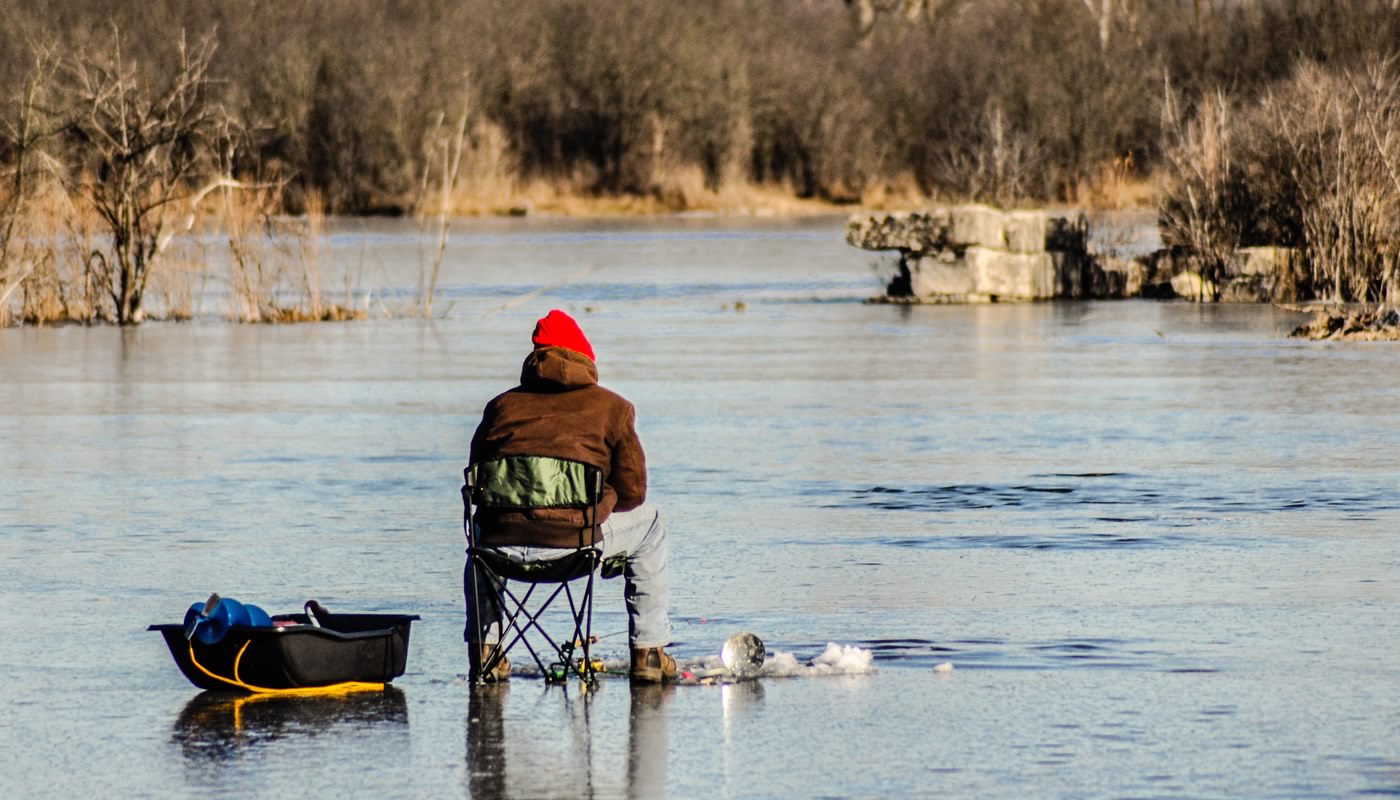 person ice fishing