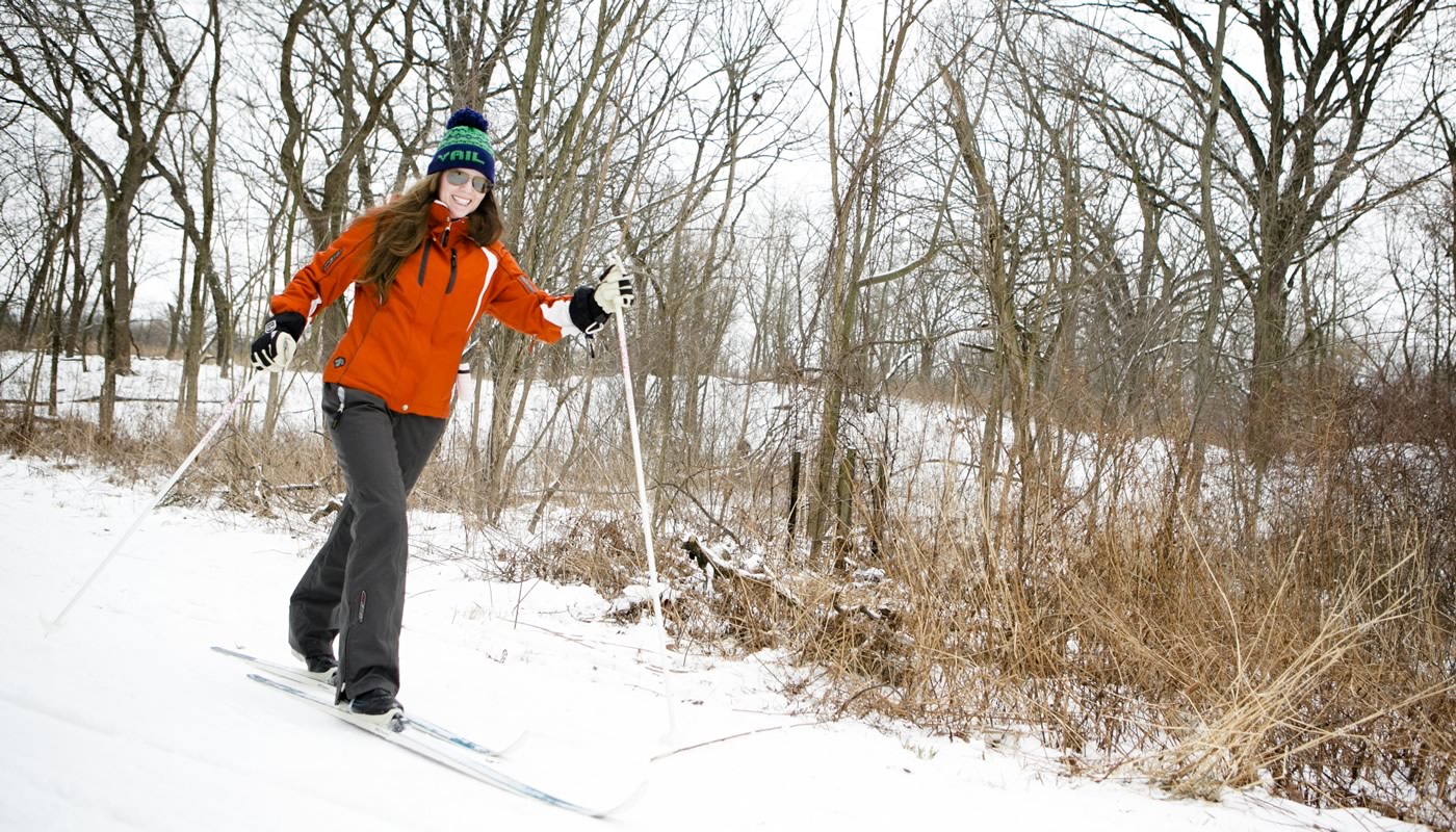 a person cross-country skiing at Sagawau Environmental Learning Center