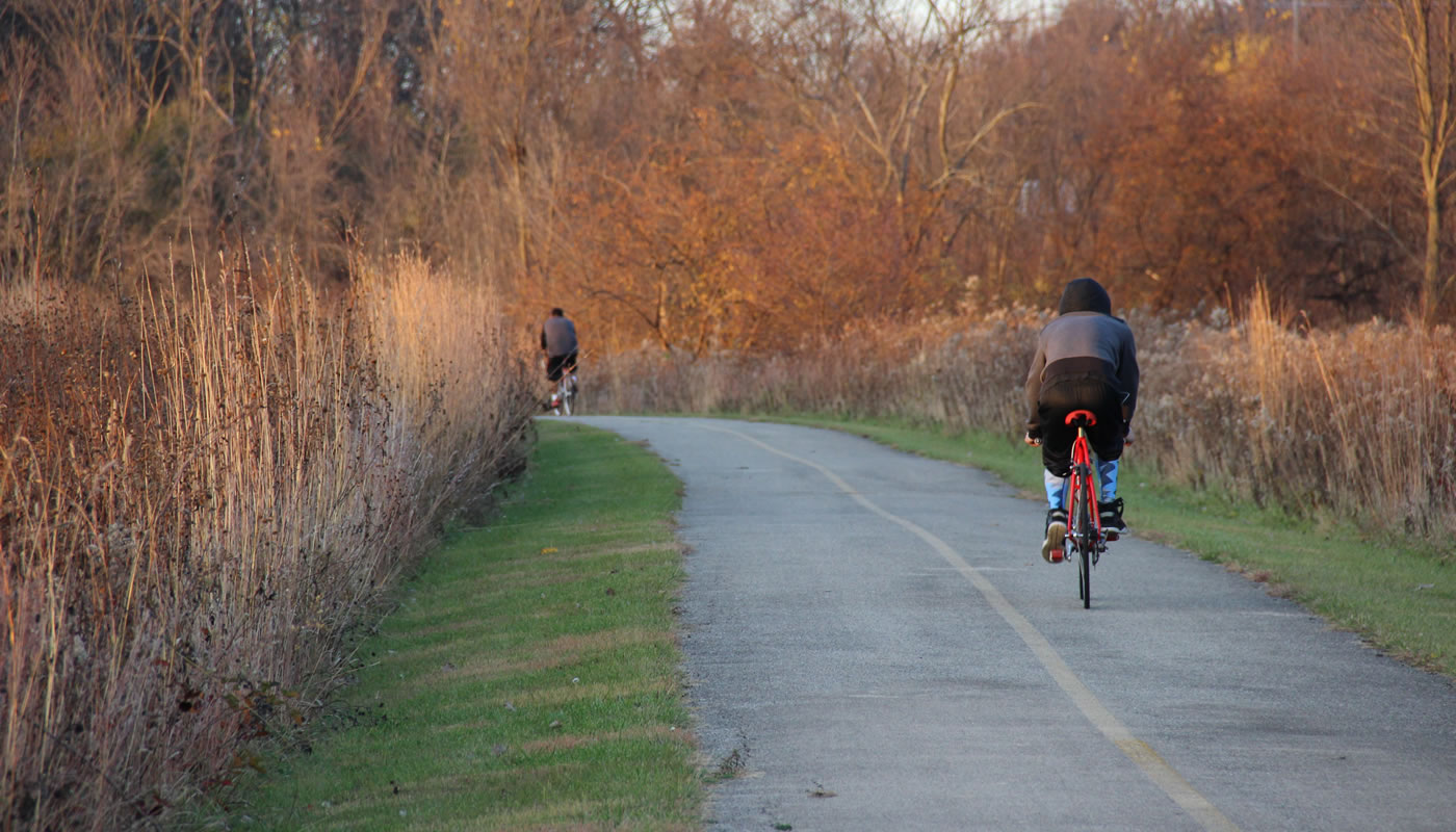 Bike riders on the Poplar Creek Trail System's Red Paved Loop