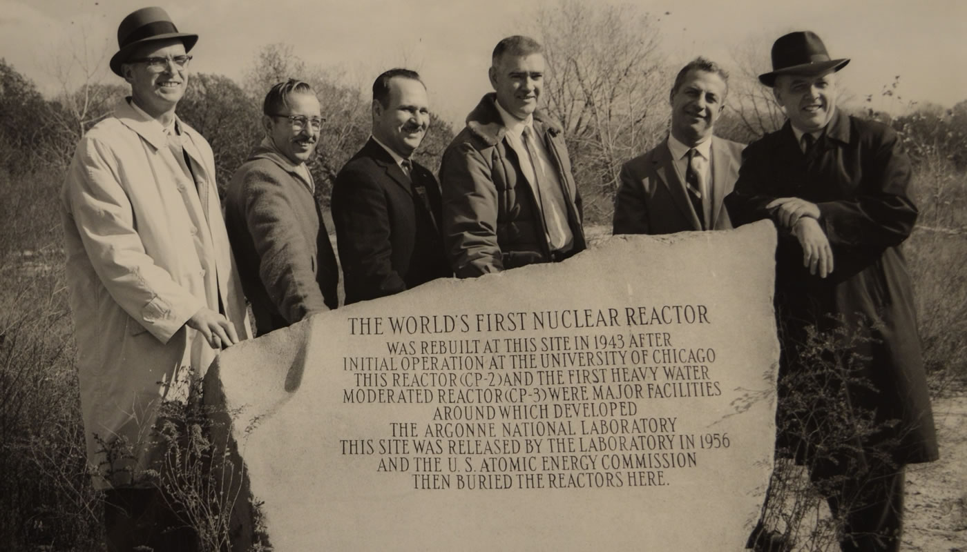 Scientists at Site A Commemorative Boulder