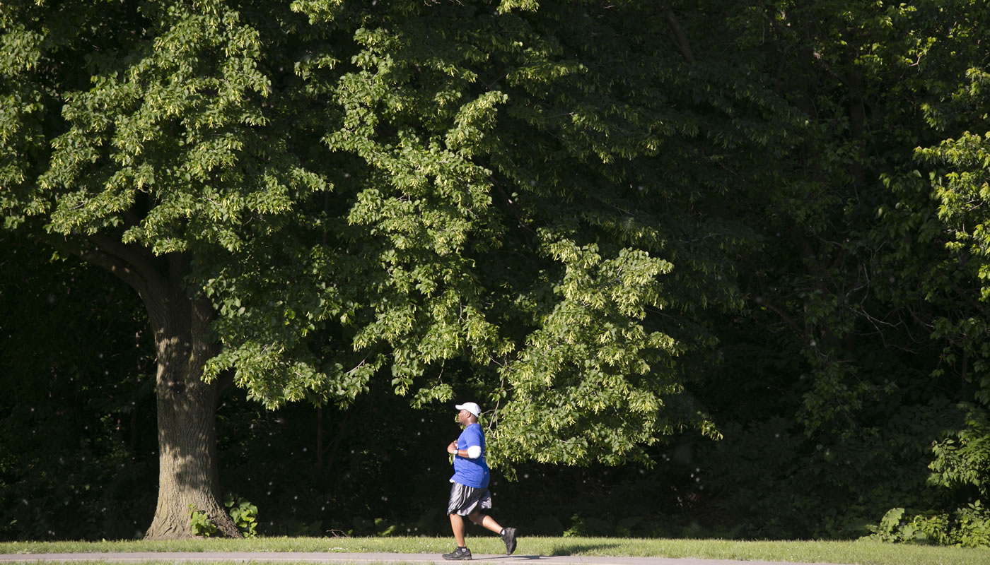 A person running on the Major Taylor Trail