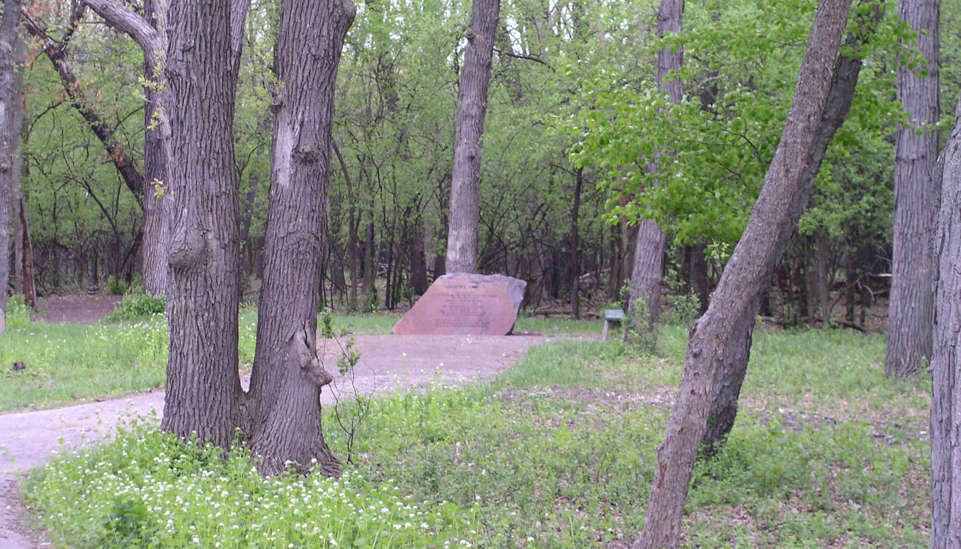 Woods and historical marker signifying the Robinson family homestead and burial grounds.