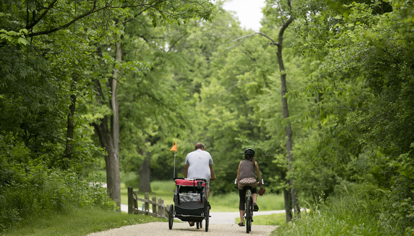 two people riding bicycles on the Salt Creek Trail System