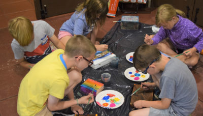 children painting inside Thatcher Woods Pavilion