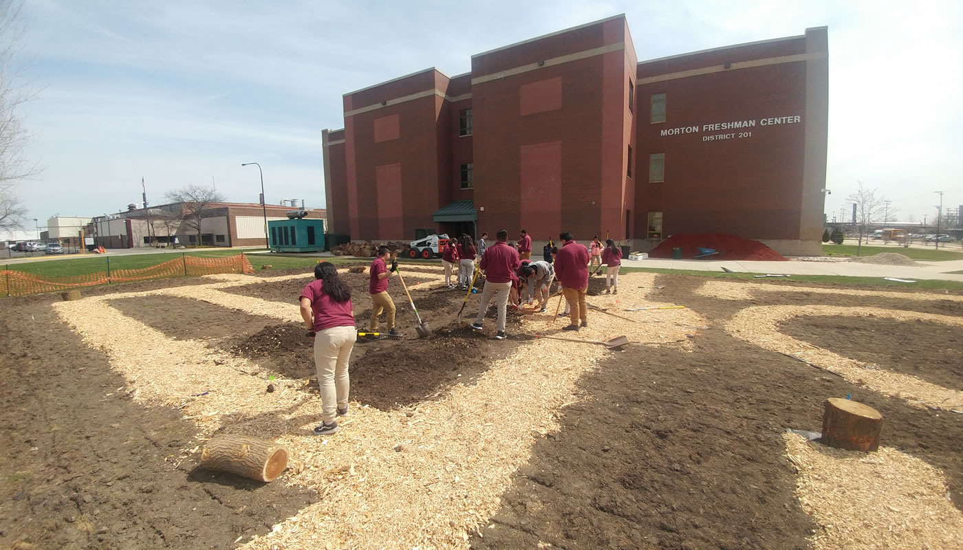 Students at Morton Freshman Center preparing their garden.
