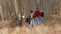 volunteers measuring a gully