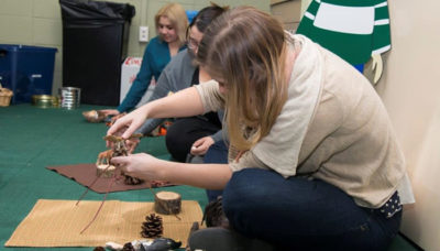 adults engaged in nature play