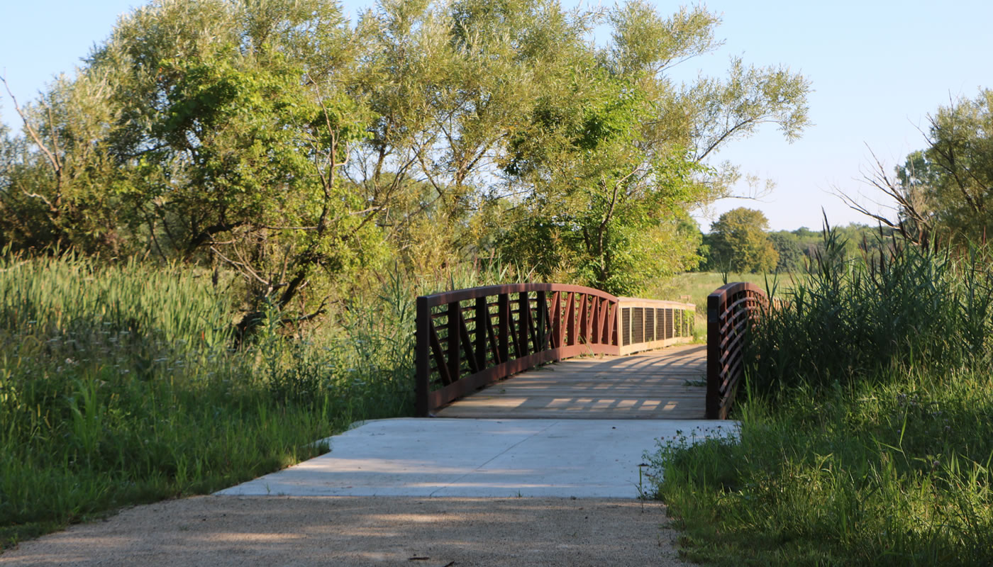 a trail and bridge at Oak Forest Heritage Preserve