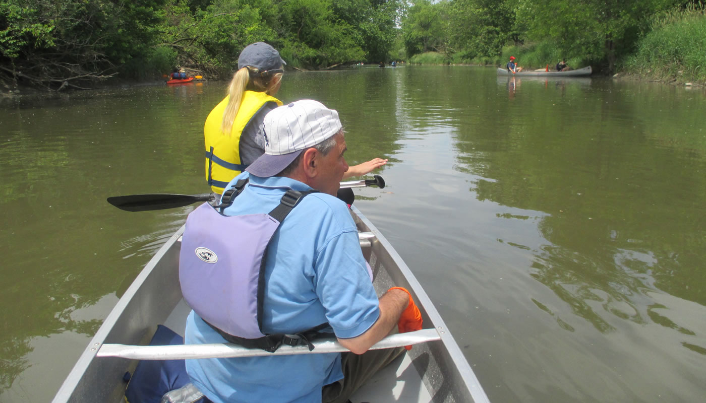 two people in a canoe on the Little Calumet River