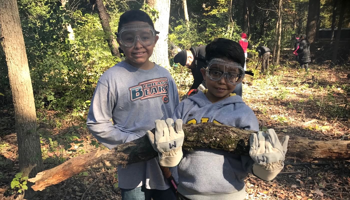 Two volunteers at Possum Hollow Woods