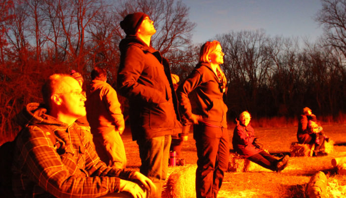 people looking at a bonfire at Camp Dan Beard