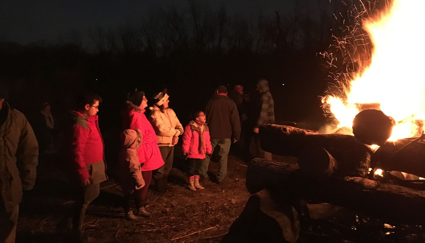 people around a bonfire at Camp Shabbona Woods