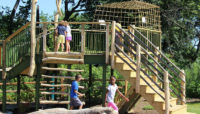 children playing on the treehouse at Dan Ryan Woods