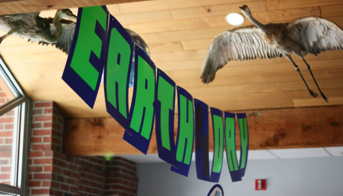 an Earth Day banner at Sand Ridge Nature Center