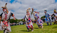 traditional grass dancers at the annual American Indian Center Chicago Powwow