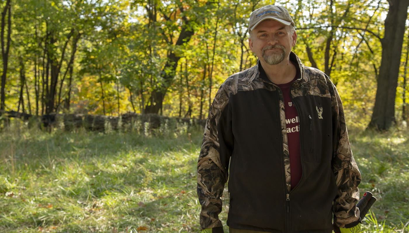 Carl Schnakenberg volunteering in the forest preserves