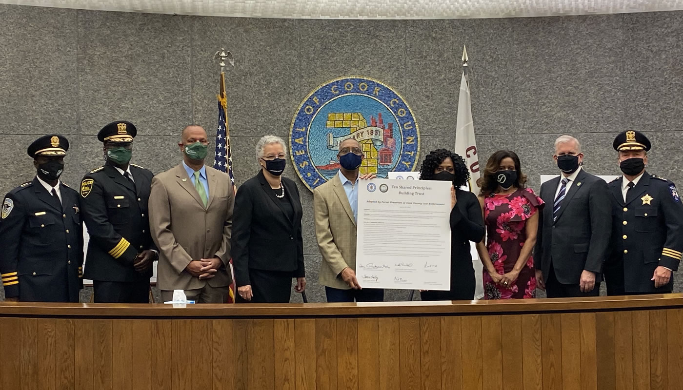 President Preckwinkle with General Superintendent Arnold Randall, commissioners and representatives from the state and local NAACP chapters and Illinois Association of Chiefs of Police with signed Ten Shared Principles.