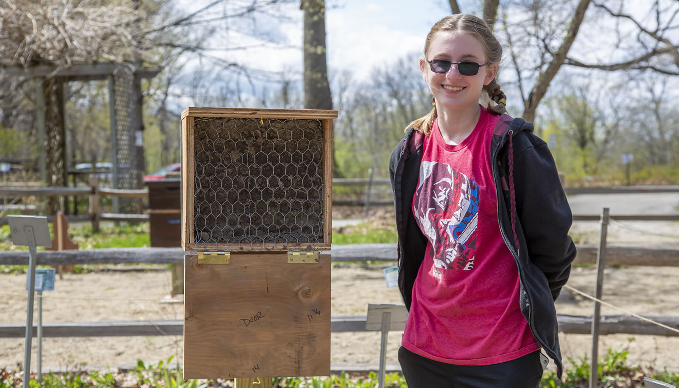 Madeline Painter with a bee house at River Trail Nature Center.