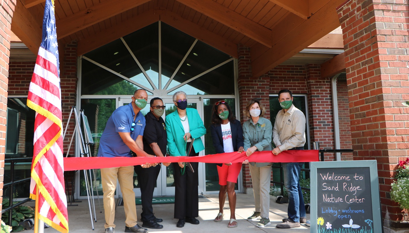 President Preckwinkle and other officials cut the ribbon at Sand Ridge Campus