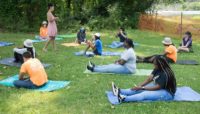 A group of youth participate in a mindfulness program
