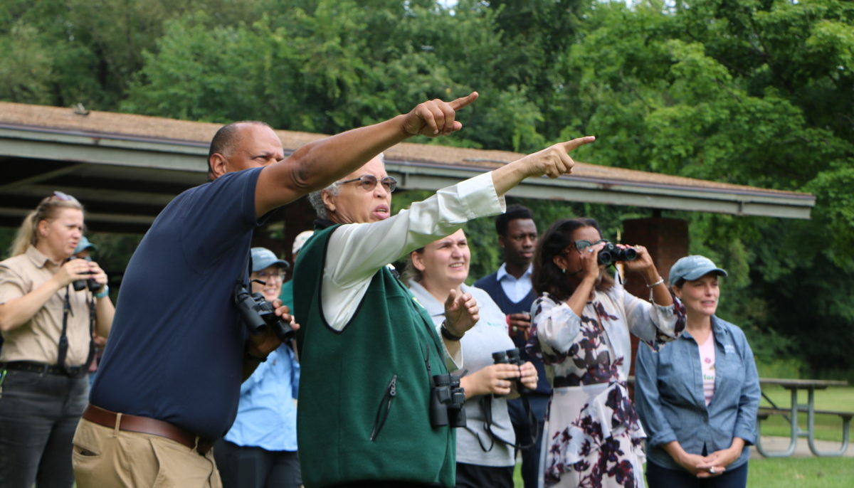 Arnold Randall, Toni Preckwinkle, and staff at a fall bird migration event