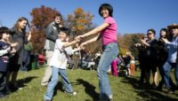 People dancing at the River Trail Nature Center Fall Festival in 2012.