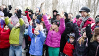 A crowd participates in activities at River Trail Nature Center's Maple Syrup Festival.