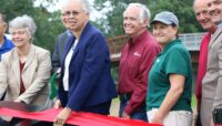 A group at a ribbon cutting ceremony