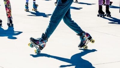 A group of people skating together.