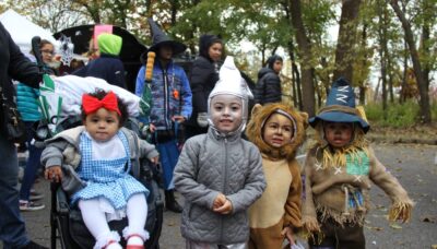 Children at a Trunk or Treat event for Halloween.