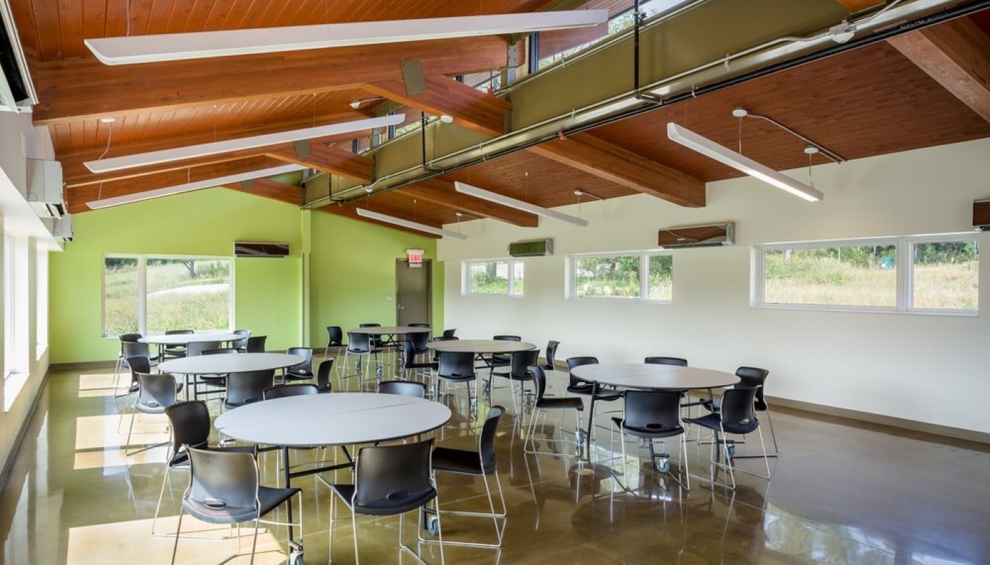 The interior of a large indoor pavilion building.